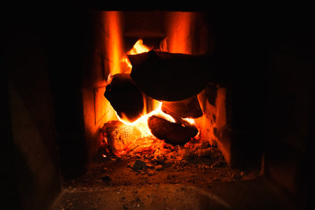 Firewood and fire in the stove.. Burning Fire. Flames and fire from burning wood.の写真素材