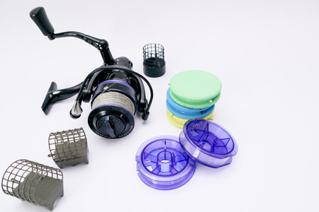 Close-up of different fishing tackle. fishing tackle on a white. Selective focusの写真素材