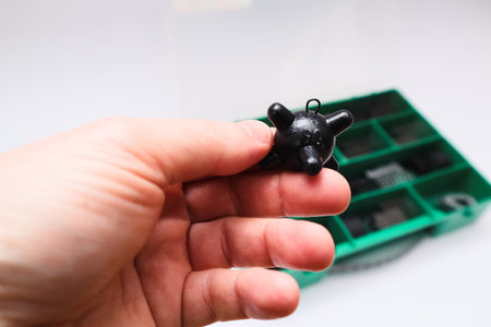 Close-up of different fishing tackle. fishing tackle on a white. Selective focusの写真素材