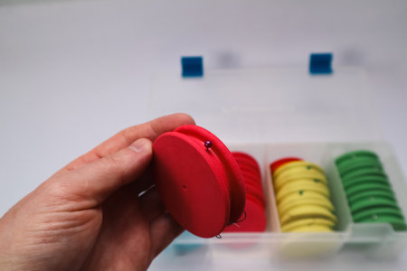 Close-up of different fishing tackle. fishing tackle on a white. Selective focusの写真素材