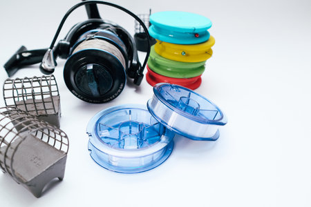 Close-up of different fishing tackle. fishing tackle on a white. Selective focusの写真素材