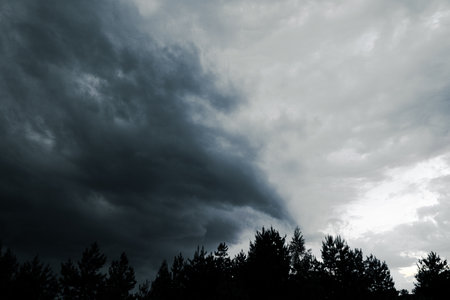 Beautiful colorful stormy sky at sunset. Sunset with mood stormy sky. A dramatic sunset breaking...