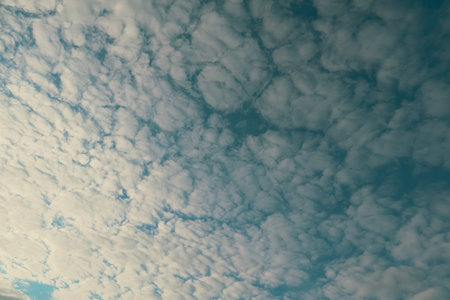 Nature background of sky with blue clouds on sunset. Beautiful cloud above dramatic blue sunset sky....