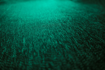 Fabric texture. Smooth turquoise satin luxury cloth texture can be used as abstract holidays...