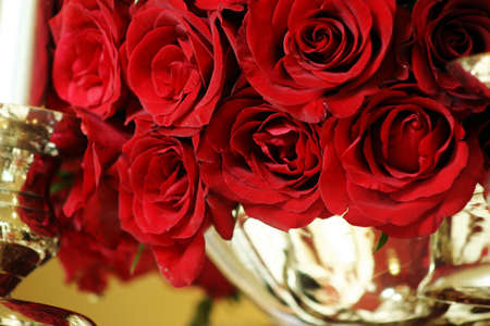 red rose decorations in silver vaseの写真素材
