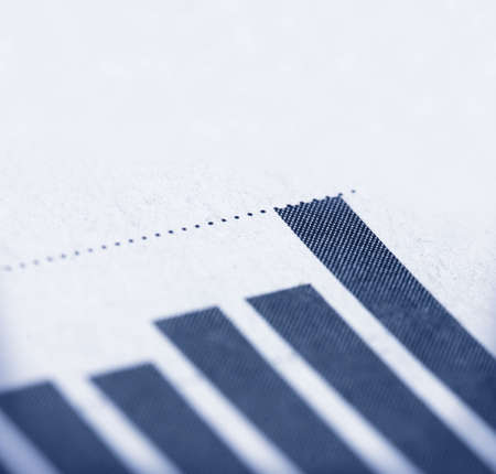 Shallow depth of field on last, highest bar of bar graph.の写真素材