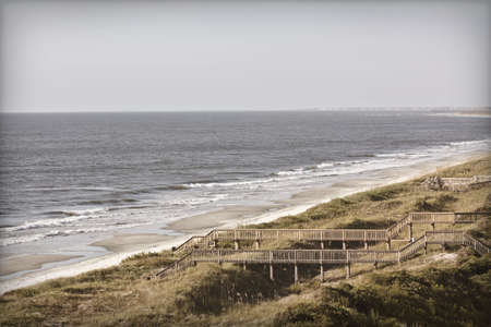 Beach photo with retro or vintage look. Can be aged even further.の写真素材