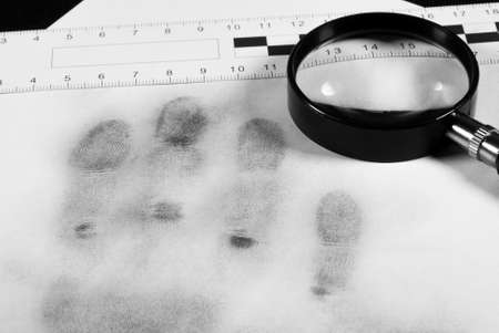 fingerprint with magnifying glassの写真素材