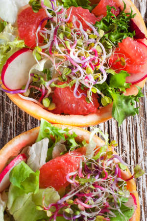 Grapefruit salad in grapefruit bowl.の写真素材