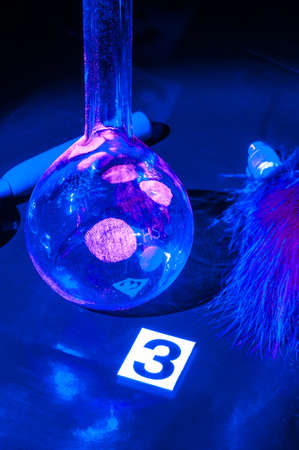 True fluorescence fingerprint with ruler.の写真素材