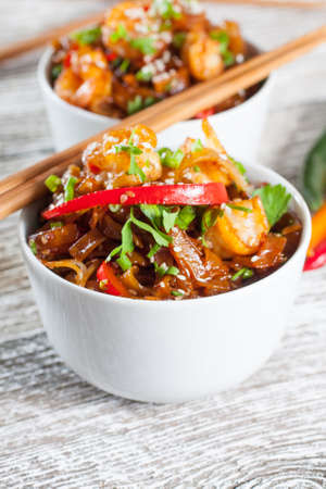 Fried rice noodles with shrimp - selective focus.の写真素材