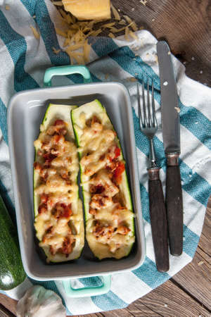 Fresh baked zucchini with meat and cheese.の写真素材