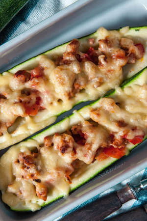 Fresh baked zucchini with meat and cheese.の写真素材