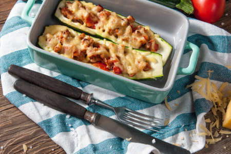 Fresh baked zucchini with meat and cheese.の写真素材
