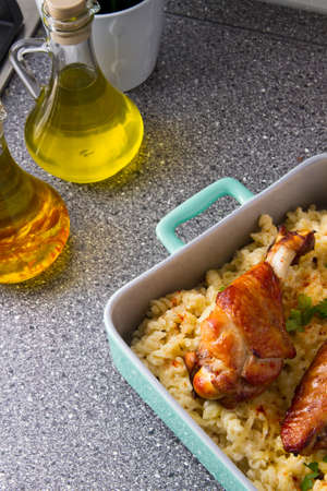 Baked spicy wings of turkey with cheese noodles.の写真素材