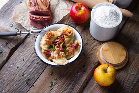 Polish fried dumplings with meat, onion and bacon.の写真素材