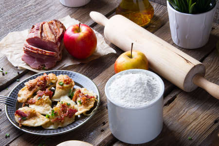 Polish fried dumplings with meat, onion and bacon.の写真素材