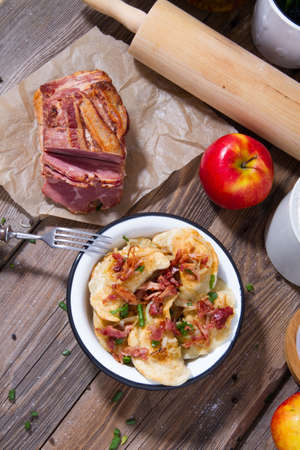 Polish fried dumplings with meat, onion and bacon.の写真素材
