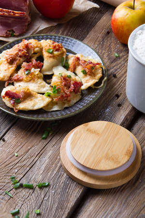 Polish fried dumplings with meat, onion and bacon.の写真素材