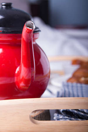 Romantic breakfast in bed on a wooden tray.の写真素材