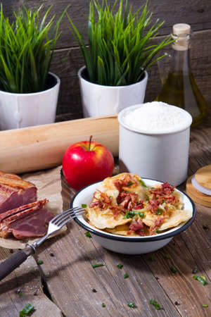 Polish fried dumplings with meat, onion and bacon.の写真素材