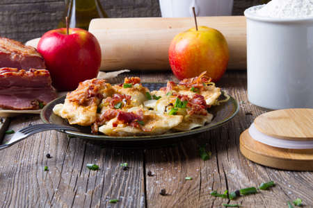 Polish fried dumplings with meat, onion and bacon.の写真素材