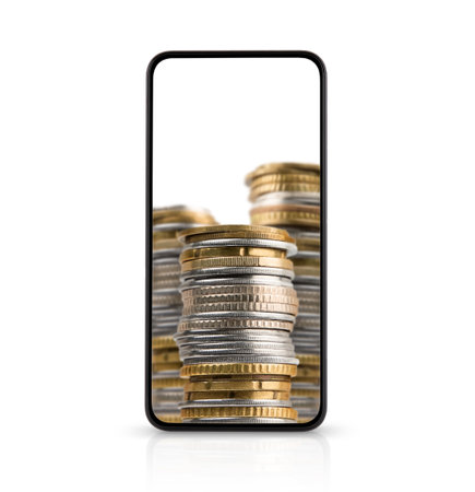 Stacks of coins on blank smartphone display isolated on white background. business concept