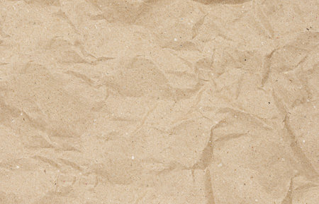 Crumpled brown paper as a backgroundの写真素材