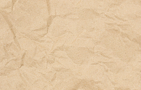 Crumpled recycled paper texture backgroundの写真素材