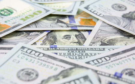 Heap of one hundred dollar bills with portrait of President Benjamin Franklin. Business conceptの写真素材