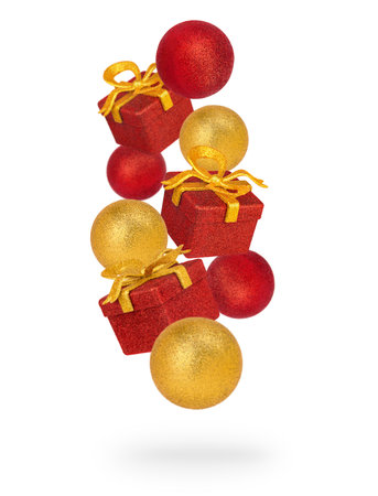 Glittering gift boxes and baubles levitation isolated on white background. Christmas sale conceptの写真素材