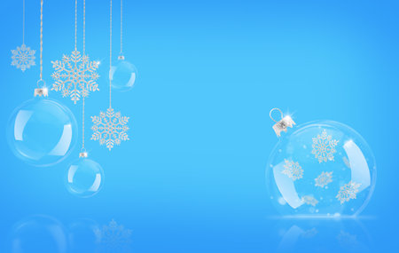 Christmas glittering snowflakes and ornaments on blue background. Festive Christmas background with copy spaceの写真素材