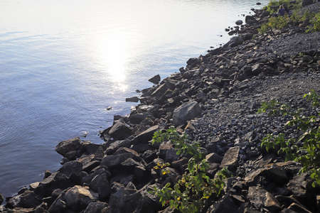 Alpine lake with cold water and wonderful views of the Ural mountains in siberia.
