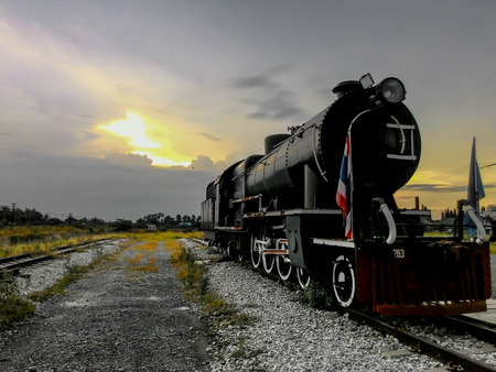A Siamese Steam locomotive by the sunsetの写真素材