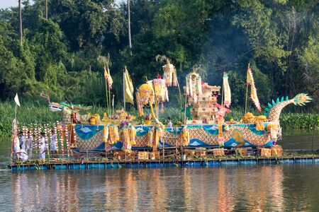 Nakornpathom, Thailand - October 29, 2017: Parade of floating traditional Chinese dragon on Tha Chin river to celebrate Vegetarian Festival.のeditorial素材