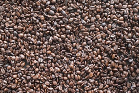 Roasted coffee beans used as backgroundの写真素材