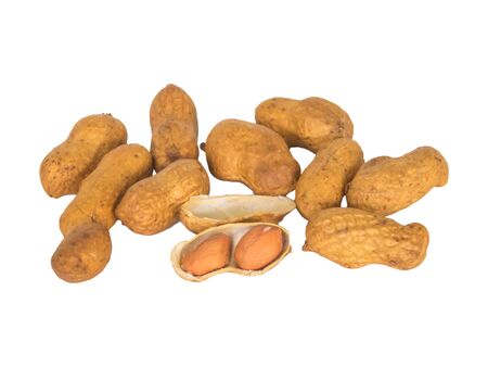 peanuts and peanut nutshell in isolated white background with clipping pathの写真素材