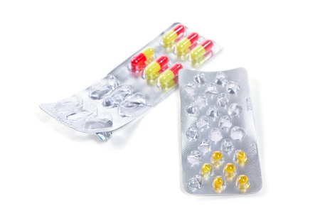 Packs of pills isolated on white background