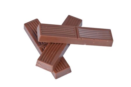 Whole small milk chocolate bars isolated on white backgroundの写真素材