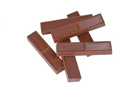 Whole small milk chocolate bars isolated on white backgroundの写真素材