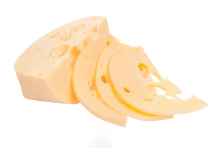 Big piece and sliced of cheese close isolated up on a white backgroundの写真素材