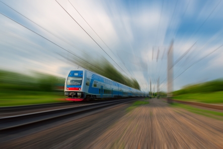 High-speed commuter train with motion blurの写真素材