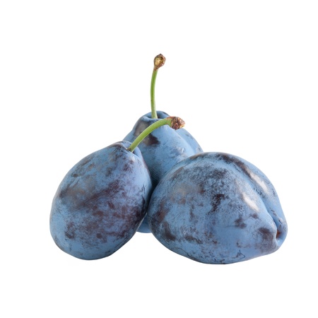 Whole ripe fresh plums isolated on white backgroundの写真素材