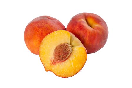 Ripe peach, whole and half with bonelet isolated on white backgroundの写真素材