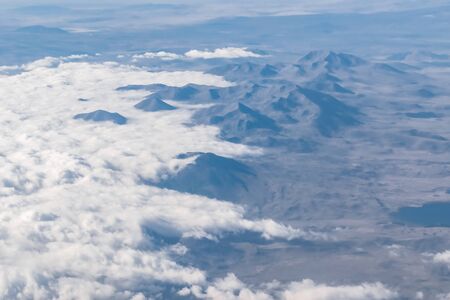 Landscape with mountains and clouds with a bird's-eye viewの写真素材
