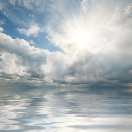 Beautiful clouds reflection in ocean, seascape, nature sky background