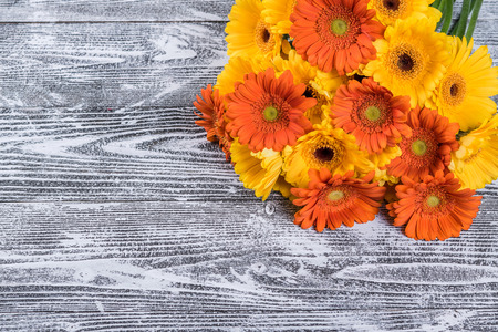 Gerbera flowers on rustic background, floral postcardの写真素材