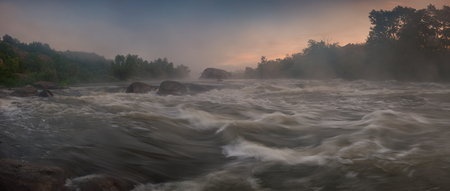 Panorama with bank of river in morning fog, summer landscape, long exposureの写真素材