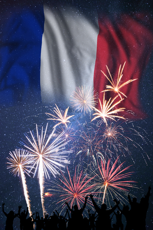 People looks holiday fireworks on independence day of France, flag in skyの写真素材