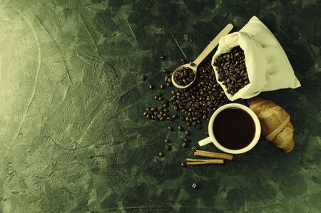Breakfast with aromatic black coffee, good morning, great start to the day. Coffee break, copy space. Retro stylization, vintage film filterの写真素材